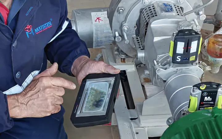 Technician performing pump diagnostics