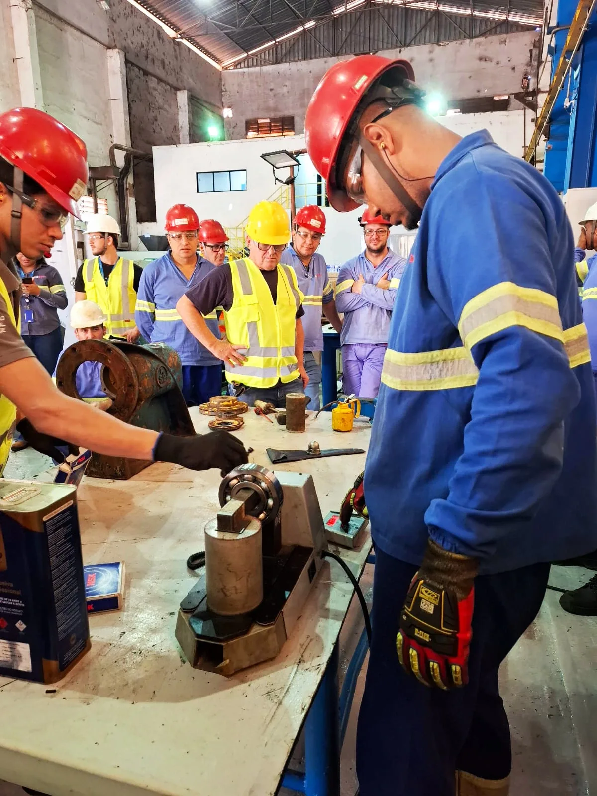 Technical team performing maintenance on an industrial pump